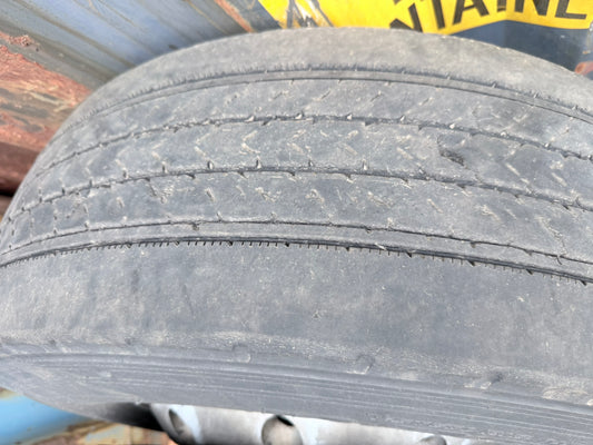 Bridgesone 285/70R19.5 tire with a rim